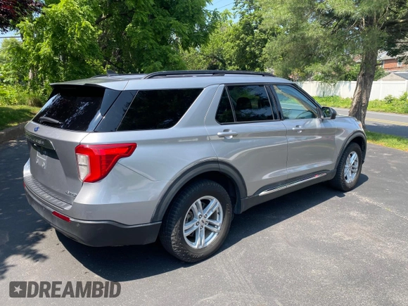 2021 Ford Explorer XLT z VIN 1FMSK8DH1MGB41704, wystawiony jako Copart lot #59941855 z przebiegiem 88 599 mil mil oraz Czysty tytuł • Clean title. Historia ofert i sprzedaży dostępna na DreamBid. Obrazek 4.