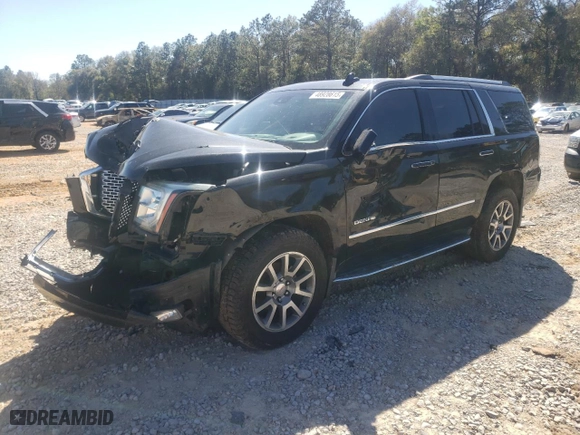 2016 GMC Yukon Denali with VIN 1GKS2CKJ9GR262992, listed as a Copart auction lot 48928615 with 146,187 mi miles and Salvage Title. Bid and sale history available at carsss.com. Image 1.