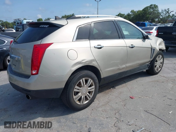 2013 Cadillac SRX Luxury Collection with VIN 3GYFNCE3XDS632366, listed as a IAAI auction lot 42231784 with 85,591 mi miles and . Bid and sale history available at DreamBid. Image 4.