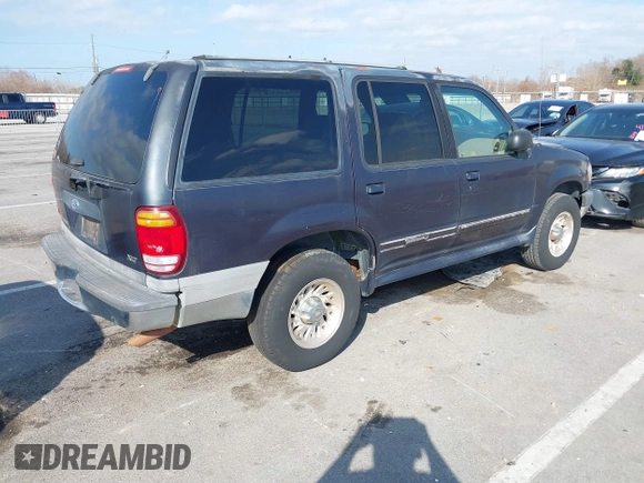 1999 Ford Explorer XLT z VIN 1FMZU32E6XUA07927, wystawiony jako IAAI lot #41489418 z przebiegiem 246 806 mil mil oraz . Historia ofert i sprzedaży dostępna na DreamBid. Obrazek 4.
