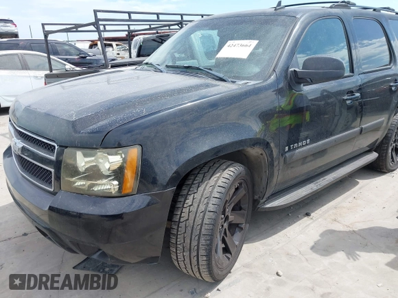 2007 Chevrolet Tahoe LT with VIN 1GNFC13087R188069, listed as a IAAI auction lot 42473664 with 195,237 mi miles and . Bid and sale history available at DreamBid. Image 2.