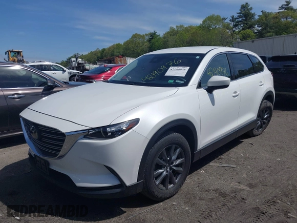 2021 Mazda CX-9 Touring z VIN JM3TCBCYXM0521323, wystawiony jako IAAI lot #42190976 z przebiegiem 56 652 mil mil oraz . Historia ofert i sprzedaży dostępna na DreamBid. Obrazek 17.