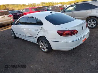 2014 Volkswagen CC R-Line with VIN WVWBP7AN0EE521995, listed as a IAAI auction lot 41213732 with 113,421 mi miles. Bid and sale history available at carsss.com. Image 3.