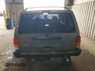 1998 Jeep Cherokee Sport with VIN 1J4FJ68S0WL152197, listed as a Copart auction lot 52512605 with Not provided miles and Salvage title. Bid and sale history available at DreamBid. Image 6.