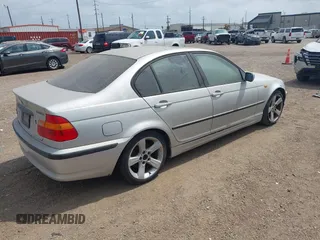 2005 BMW 3 Series 325i with VIN WBAEV33485KW18747, listed as a IAAI auction lot 42145384 with 147,120 mi miles and . Bid and sale history available at carsss.com. Image 4.