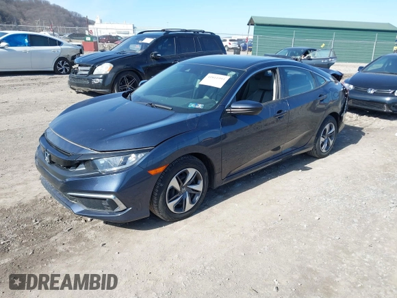 2021 Honda Civic Sedan LX with VIN 2HGFC2F66MH547284, listed as a IAAI auction lot 41811993 with 47,848 mi miles. Bid and sale history available at carsss.com. Image 18.