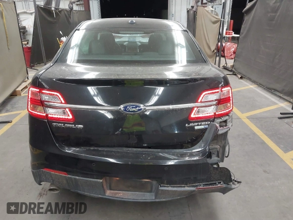2015 Ford Taurus Limited with VIN 1FAHP2J83FG152343, listed as a IAAI auction lot 41507478 with 97,648 mi miles. Bid and sale history available at carsss.com. Image 16.