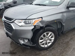 2021 Chevrolet Traverse LS with VIN 1GNERFKW6MJ145325, listed as a IAAI auction lot 41465202 with 102,406 mi miles. Bid and sale history available at carsss.com. Image 6.