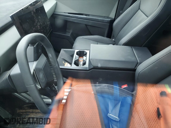 2024 Tesla Cybertruck Cyberbeast z VIN 7G2CEHEE1RA037505, wystawiony jako Copart lot #48383485 z przebiegiem Nie podano mil oraz Szkody całkowita. Historia ofert i sprzedaży dostępna na DreamBid. Obrazek 7.