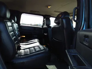 2005 Hummer H2 SUV with VIN 5GRGN23U15H117796, listed as a IAAI auction lot 41543913 with 195,560 mi miles. Bid and sale history available at carsss.com. Image 8.