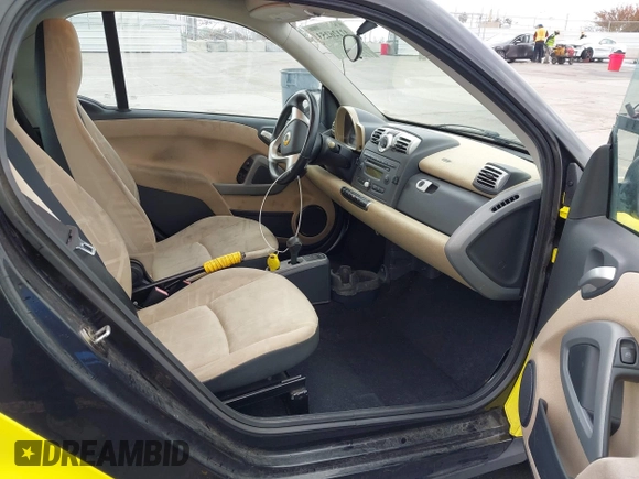 2008 Smart fortwo Pure with VIN WMEEJ31X68K189139, listed as a IAAI auction lot 42126253 with 54,767 mi miles and . Bid and sale history available at DreamBid. Image 5.