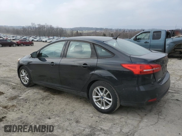 2015 Ford Focus SE with VIN 1FADP3F21FL366618, listed as a Copart auction lot 48714015 with 172,776 mi miles and Salvage Title. Bid and sale history available at DreamBid. Image 2.