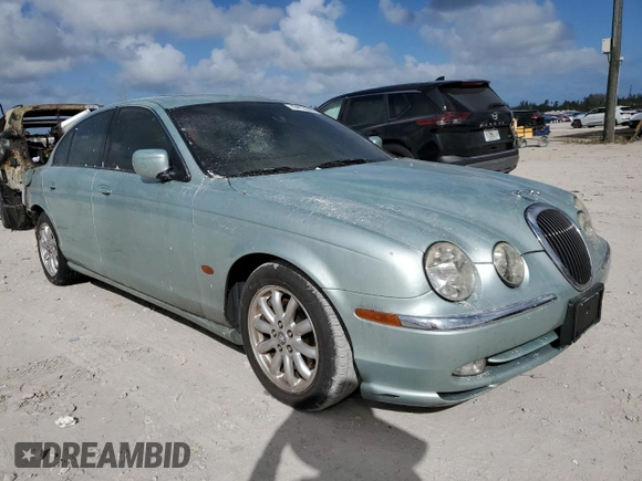 2001 Jaguar S-Type with VIN SAJDA01P51GM12659, listed as a Copart auction lot 79412564 with 113,741 mi miles and Non Repairable. Bid and sale history available at DreamBid. Image 4.