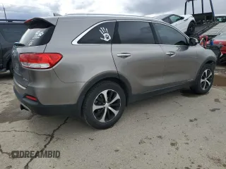2016 Kia Sorento EX with VIN 5XYPHDA59GG129660, listed as a Copart auction lot 49499595 with 104,784 mi miles and Salvage Title. Bid and sale history available at carsss.com. Image 3.