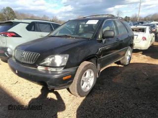 1999 Lexus RX 300 Luxury SUV with VIN JT6HF10U7X0038014, listed as a IAAI auction lot 41244208 with 183,823 mi miles. Bid and sale history available at carsss.com. Image 2.