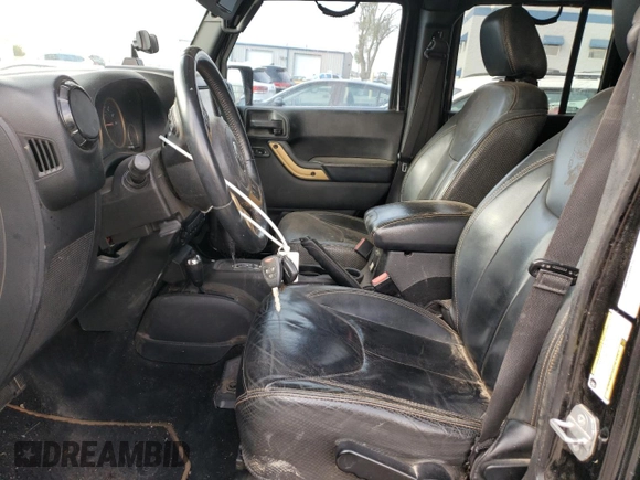 2014 Jeep Wrangler Unlimited Sahara with VIN 1C4BJWEG6EL185501, listed as a Copart auction lot 51538065 with 102,866 mi miles and Salvage Title. Bid and sale history available at carsss.com. Image 7.