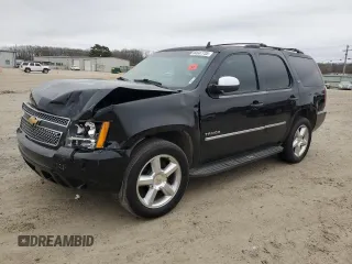 2014 Chevrolet Tahoe LTZ z VIN 1GNSCCE04ER156563, wystawiony jako Copart lot #44647735 z przebiegiem 135 849 mil mil oraz Czysty tytuł • Clean title. Historia ofert i sprzedaży dostępna na DreamBid. Obrazek 1.