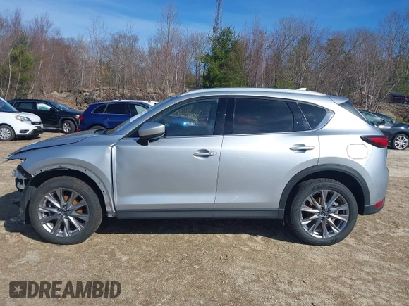2021 Mazda CX-5 Grand Touring Reserve with VIN JM3KFBAY5M0472988, listed as a IAAI auction lot 41897855 with 27,318 mi miles. Bid and sale history available at carsss.com. Image 15.