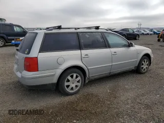 2000 Volkswagen Passat z VIN WVWRH23B6YE274455, wystawiony jako Copart lot #81634704 z przebiegiem 154 076 mil mil oraz Czysty tytuł • Clean title. Historia ofert i sprzedaży dostępna na DreamBid. Obrazek 3.