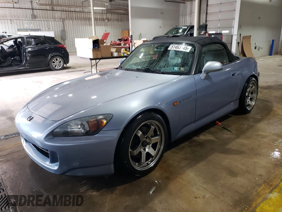 2004 Honda S2000 with VIN JHMAP21474T003557, listed as a Copart auction lot 51463145 with 228,020 mi miles and Salvage Title. Bid and sale history available at DreamBid. Image 1.