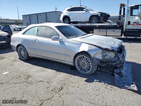 2003 Mercedes-Benz CLK-Class 3.2L with VIN WDBTJ65J43F018421, listed as a Copart auction lot 77991554 with 198,225 mi miles and Salvage Title. Bid and sale history available at carsss.com. Image 4.