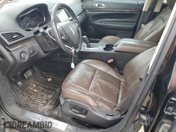 2014 Lincoln MKT with VIN 2LMHJ5FKXEBL53440, listed as a Copart auction lot 49063455 with 207,928 mi miles and Salvage Title. Bid and sale history available at DreamBid. Image 7.