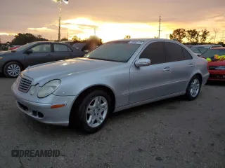 2003 Mercedes-Benz E-Class 3.2L with VIN WDBUF65J33A141727, listed as a Copart auction lot 73990174 with 0 mi miles and Salvage Title. Bid and sale history available at carsss.com. Image 1.