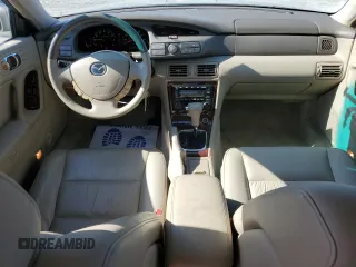 2001 Mazda Millenia z VIN JM1TA221911716600, wystawiony jako Copart lot #57639185 z przebiegiem 86 947 mil mil oraz Tytuł czysty. Historia ofert i sprzedaży dostępna na DreamBid. Obrazek 8.