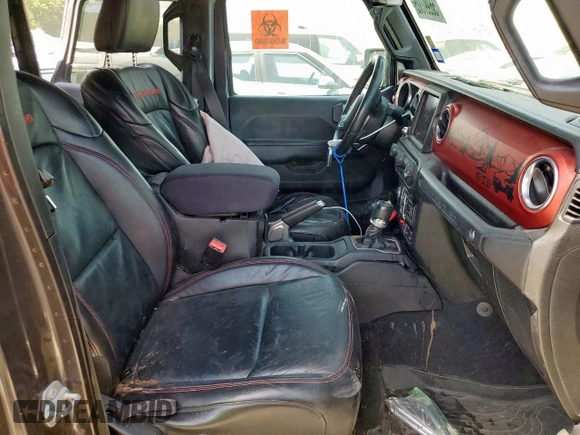 2018 Jeep Wrangler Unlimited Rubicon with VIN 1C4HJXFG6JW166731, listed as a Copart auction lot 56997385 with 117,713 mi miles and Salvage title. Bid and sale history available at DreamBid. Image 7.