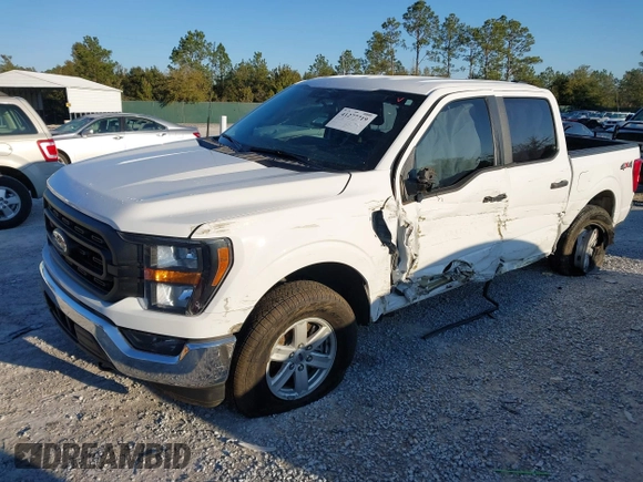 2023 Ford F-150 XL with VIN 1FTEW1EP0PKD78656, listed as a IAAI auction lot 41277719 with 21,825 mi miles. Bid and sale history available at carsss.com. Image 2.