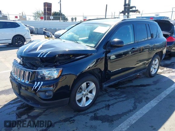 2016 Jeep Compass Latitude with VIN 1C4NJCEB2GD628384, listed as a IAAI auction lot 41752694 with 122,589 mi miles. Bid and sale history available at carsss.com. Image 2.