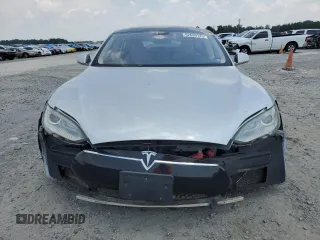 2013 Tesla Model S с VIN 5YJSA1DNXDFP04134, выставлен на аукционе Copart как лот 62660125 с пробегом 150 560 миль миль и Чистый • Clean title. История ставок и продаж доступна на DreamBid. Изображение 5.