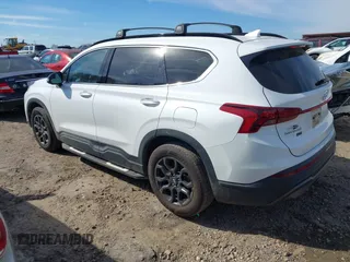 2023 Hyundai Santa Fe XRT with VIN 5NMS64AJ9PH497355, listed as a IAAI auction lot 41667596 with 67,584 mi miles. Bid and sale history available at carsss.com. Image 3.