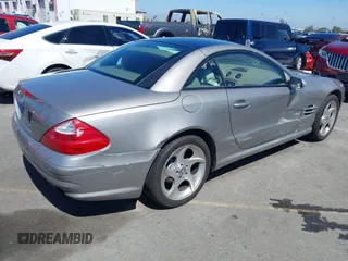 2004 Mercedes-Benz SL 500 with VIN WDBSK75F64F072167, listed as a IAAI auction lot 41862494 with 68,025 mi miles and . Bid and sale history available at DreamBid. Image 4.