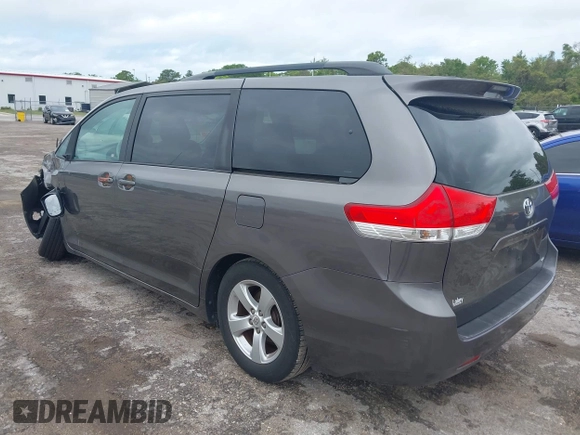 2014 Toyota Sienna LE AAS with VIN 5TDKK3DC9ES448461, listed as a IAAI auction lot 41986724 with 102,930 mi miles and . Bid and sale history available at carsss.com. Image 3.