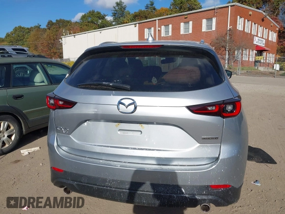 2023 Mazda CX-5 2.5 S Premium Package with VIN JM3KFBDM6P0158294, listed as a IAAI auction lot 40662093 with 15,841 mi miles. Bid and sale history available at carsss.com. Image 16.