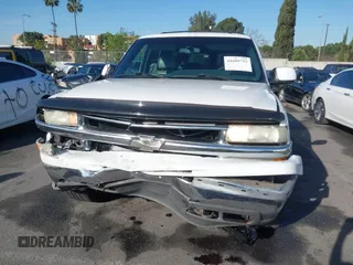 2002 Chevrolet Suburban LS with VIN 1GNEC16T32J198422, listed as a IAAI auction lot 41699753 with 204,504 mi miles. Bid and sale history available at carsss.com. Image 12.