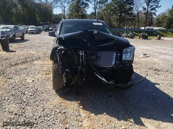 2016 GMC Yukon Denali with VIN 1GKS2CKJ9GR262992, listed as a Copart auction lot 48928615 with 146,187 mi miles and Salvage Title. Bid and sale history available at carsss.com. Image 12.