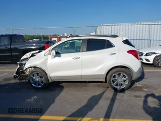 2016 Buick Encore Premium with VIN KL4CJDSB1GB647306, listed as a IAAI auction lot 41983159 with 59,592 mi miles. Bid and sale history available at carsss.com. Image 14.