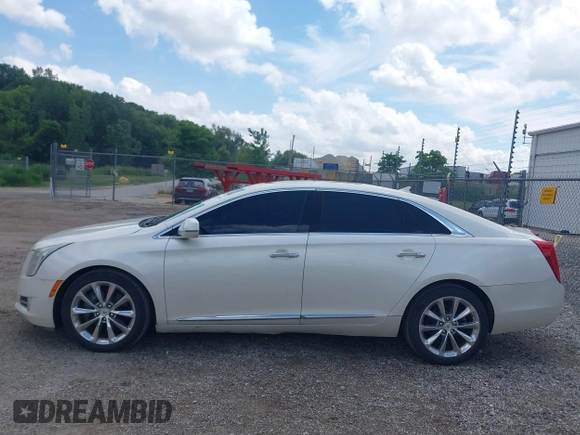 2013 Cadillac XTS Luxury with VIN 2G61P5S34D9138319, listed as a IAAI auction lot 42626756 with 88,743 mi miles and . Bid and sale history available at DreamBid. Image 14.
