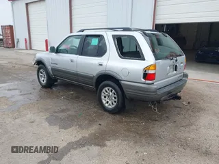 2001 Honda Passport LX z VIN 4S6CK58W714414399, wystawiony jako IAAI lot #41641270 z przebiegiem 203 093 mil mil oraz . Historia ofert i sprzedaży dostępna na DreamBid. Obrazek 3.