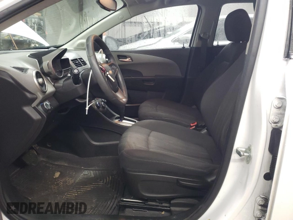 2014 Chevrolet Sonic LT with VIN 1G1JC6SH6E4239708, listed as a Copart auction lot 85530104 with 123,912 mi miles and Salvage Title. Bid and sale history available at carsss.com. Image 7.