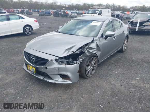 2014 Mazda 6 i Touring with VIN JM1GJ1V64E1147549, listed as a IAAI auction lot 42041025 with 124,400 mi miles and . Bid and sale history available at DreamBid. Image 17.