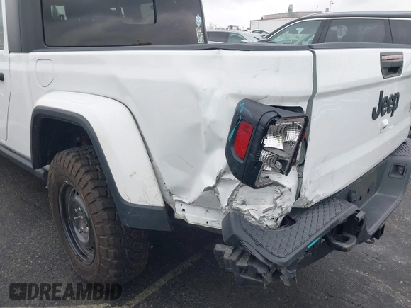 2022 Jeep Gladiator Willys with VIN 1C6HJTAG1NL148524, listed as a IAAI auction lot 41507693 with 42,004 mi miles and . Bid and sale history available at DreamBid. Image 18.