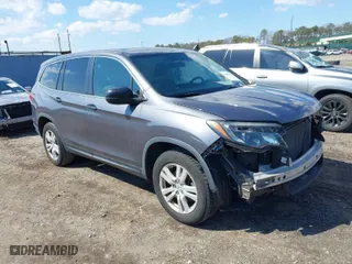 2016 Honda Pilot LX with VIN 5FNYF6H14GB082537, listed as a IAAI auction lot 41864525 with 137,097 mi miles. Bid and sale history available at carsss.com. Image 1.