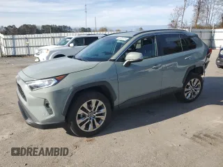 2020 Toyota RAV4 XLE Premium with VIN 2T3C1RFV6LW059183, listed as a Copart auction lot 85281574 with 91,402 mi miles and Salvage Title. Bid and sale history available at carsss.com. Image 1.