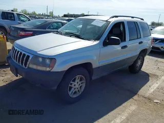 2003 Jeep Grand Cherokee Laredo with VIN 1J4GX48S03C577759, listed as a IAAI auction lot 41969103 with 91,305 mi miles. Bid and sale history available at carsss.com. Image 2.