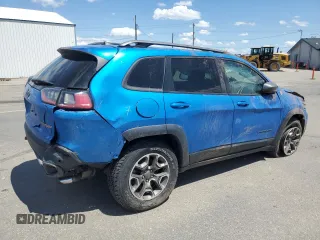 2021 Jeep Cherokee Trailhawk with VIN 1C4PJMBXXMD110436, listed as a Copart auction lot 57829375 with 46,647 mi miles and Salvage title. Bid and sale history available at DreamBid. Image 3.