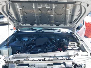 2014 Toyota Tacoma with VIN 5TFNX4CNXEX034042, listed as a IAAI auction lot 42059180 with 108,031 mi miles and . Bid and sale history available at DreamBid. Image 10.