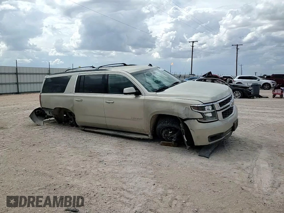 2015 Chevrolet Suburban LT with VIN 1GNSCJKC0FR153454, listed as a Copart auction lot 62672615 with 184,498 mi miles and Salvage title. Bid and sale history available at DreamBid. Image 13.